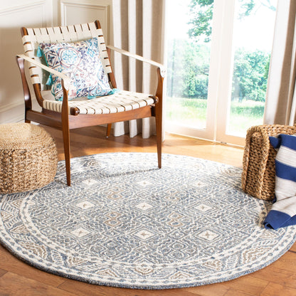 Tapis SAFAVIEH en laine Lutetia micro-bouclée faite à la main