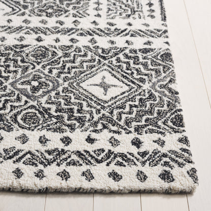 Tapis SAFAVIEH en laine Lutetia micro-bouclée faite à la main