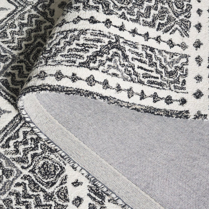 Tapis SAFAVIEH en laine Lutetia micro-bouclée faite à la main