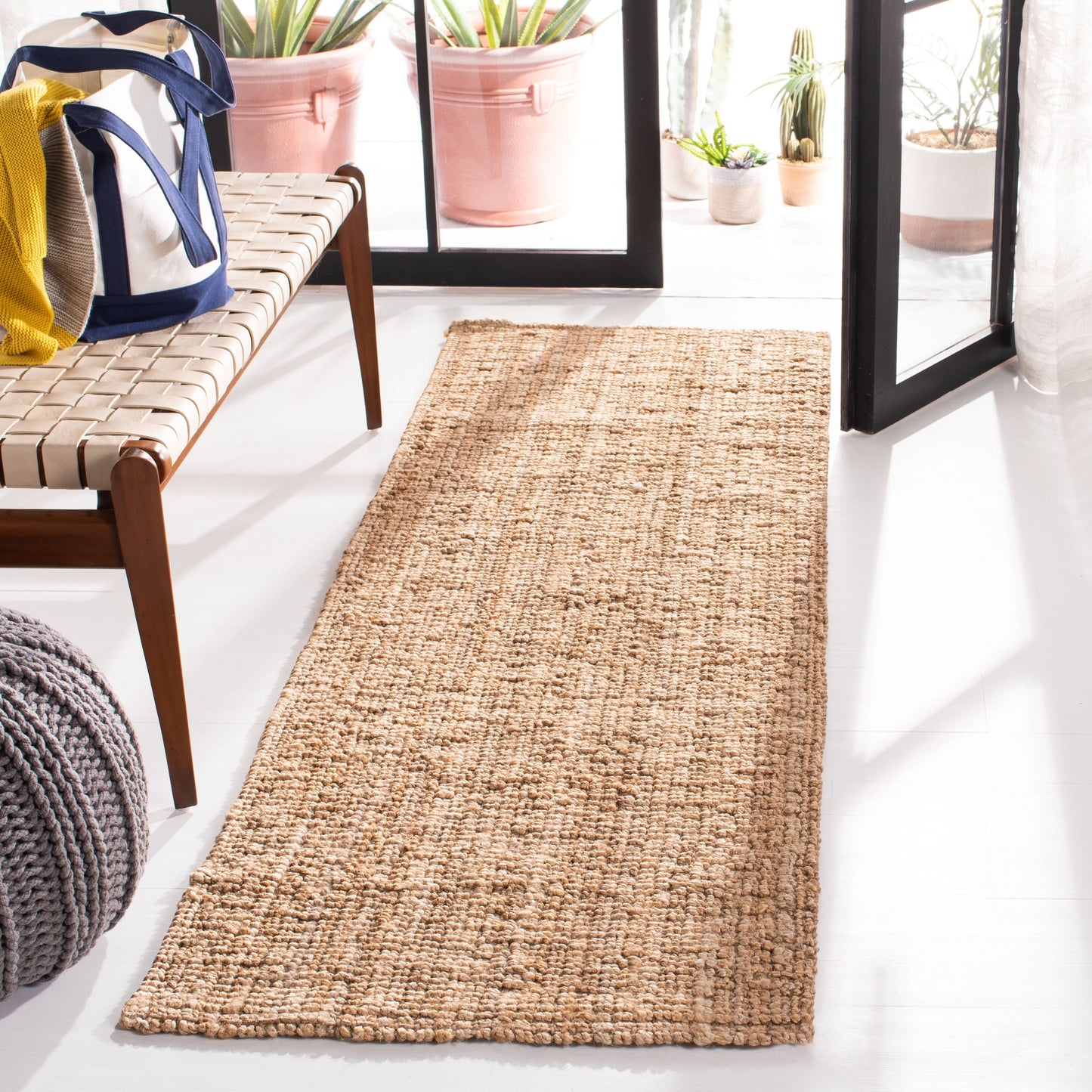 Tapis SAFAVIEH Nihada décontracté en fibre naturelle faite à la main, en jute unie.