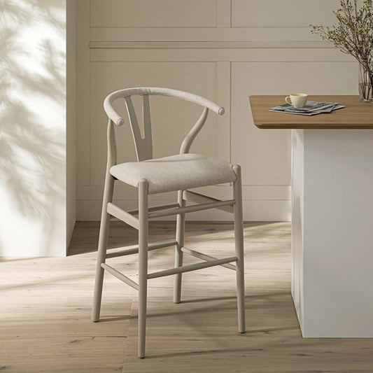 Tabouret de bar Hansel, structure taupe avec assise en tissu avoine
